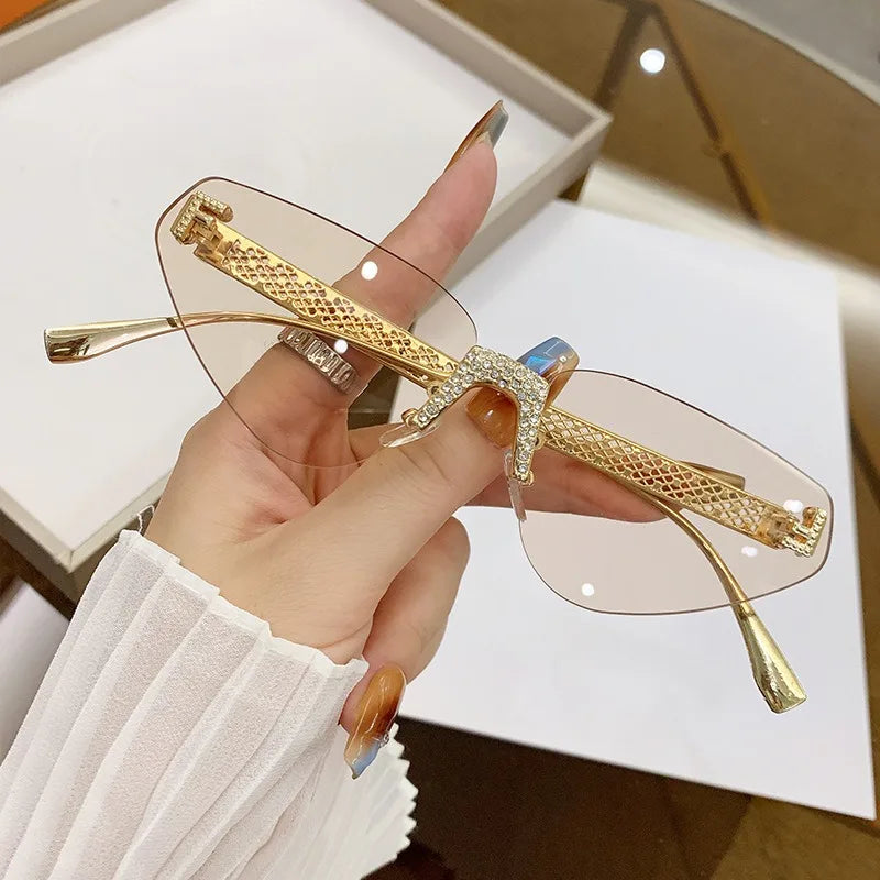 Beautiful Rimless Hollow Triangle Cat Eye F Accent UV400 Unisex Sunglasses