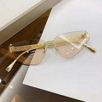 Beautiful Rimless Hollow Triangle Cat Eye F Accent UV400 Unisex Sunglasses