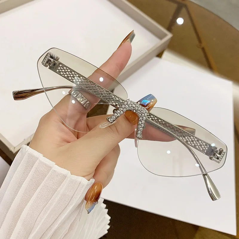 Beautiful Rimless Hollow Triangle Cat Eye F Accent UV400 Unisex Sunglasses