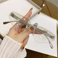 Beautiful Rimless Hollow Triangle Cat Eye F Accent UV400 Unisex Sunglasses