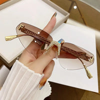 Beautiful Rimless Hollow Triangle Cat Eye F Accent UV400 Unisex Sunglasses