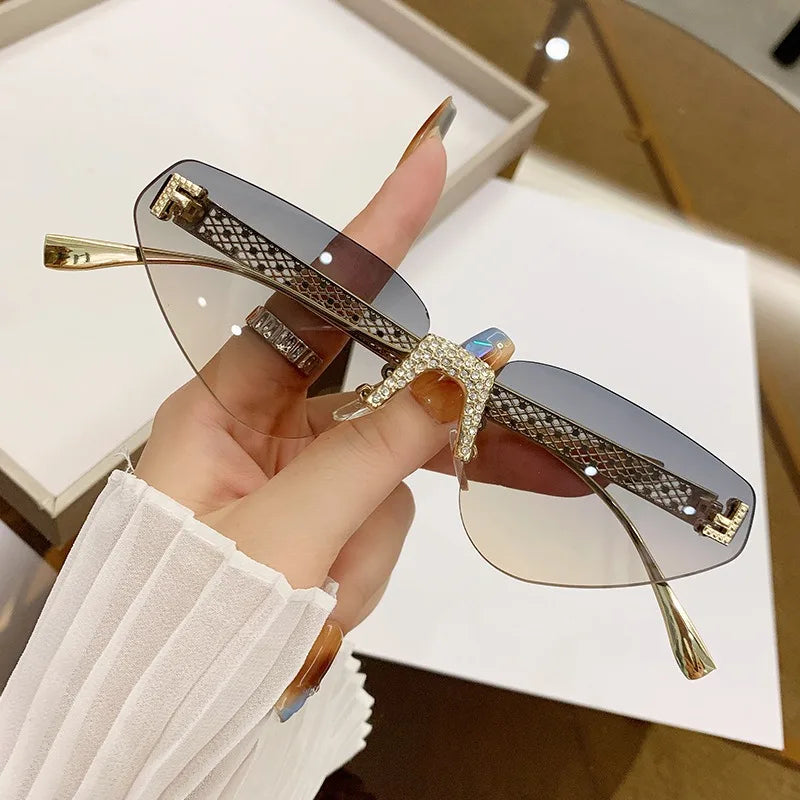 Beautiful Rimless Hollow Triangle Cat Eye F Accent UV400 Unisex Sunglasses
